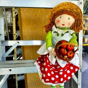 Vibrant Orange Hair Decorative Doll with Straw Hat and Polka Dot Skirt apples